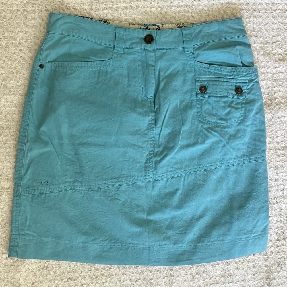 Lole women’s size 4 turquoise aqua skirt. Multi pocket.